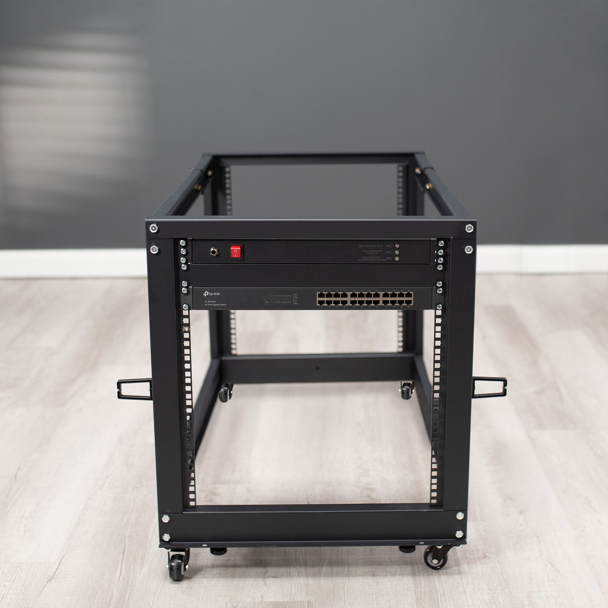 Black network rack with multiple ports.