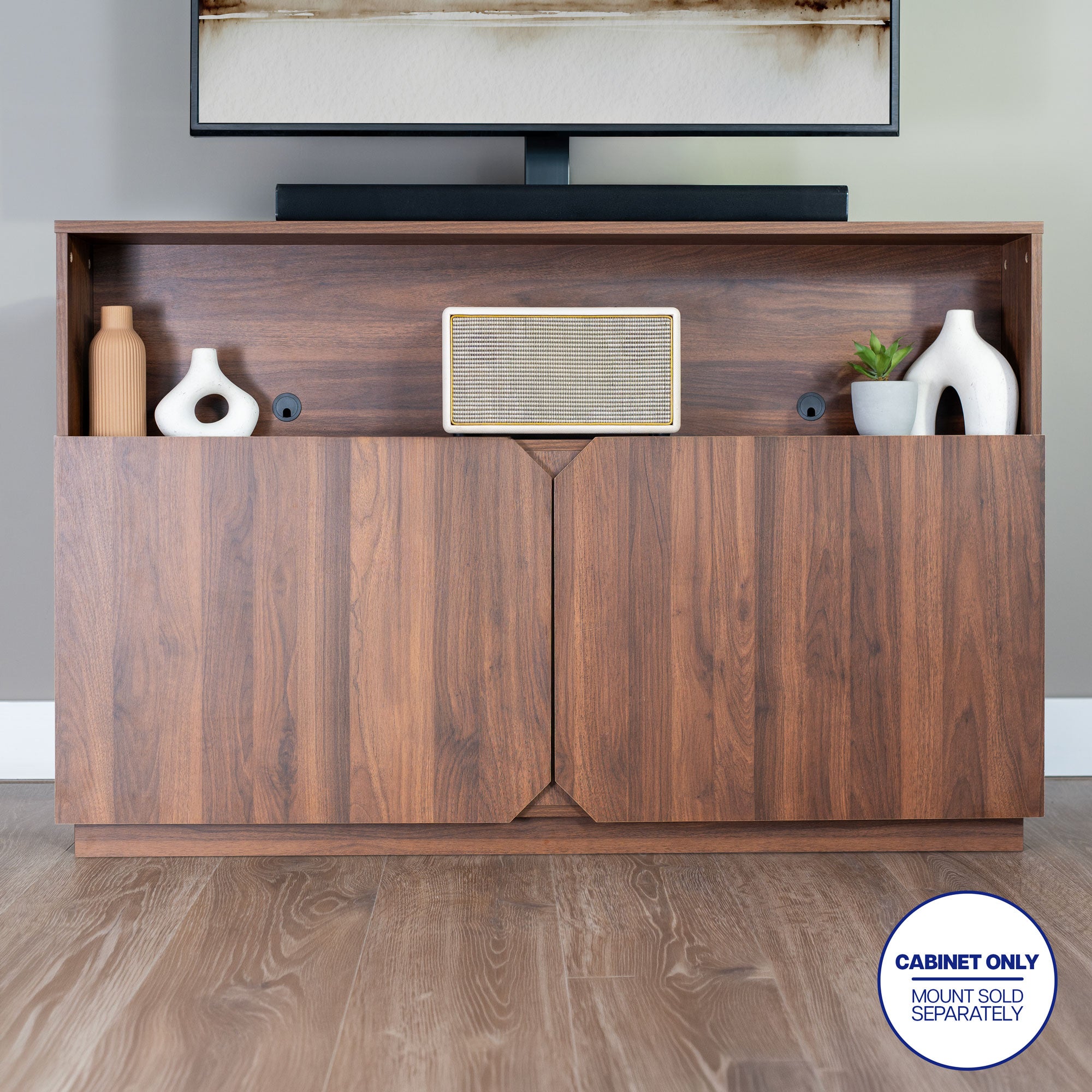 Walnut TV lift cabinet with concealed television and enclosed storage for a clean furniture-style appearance