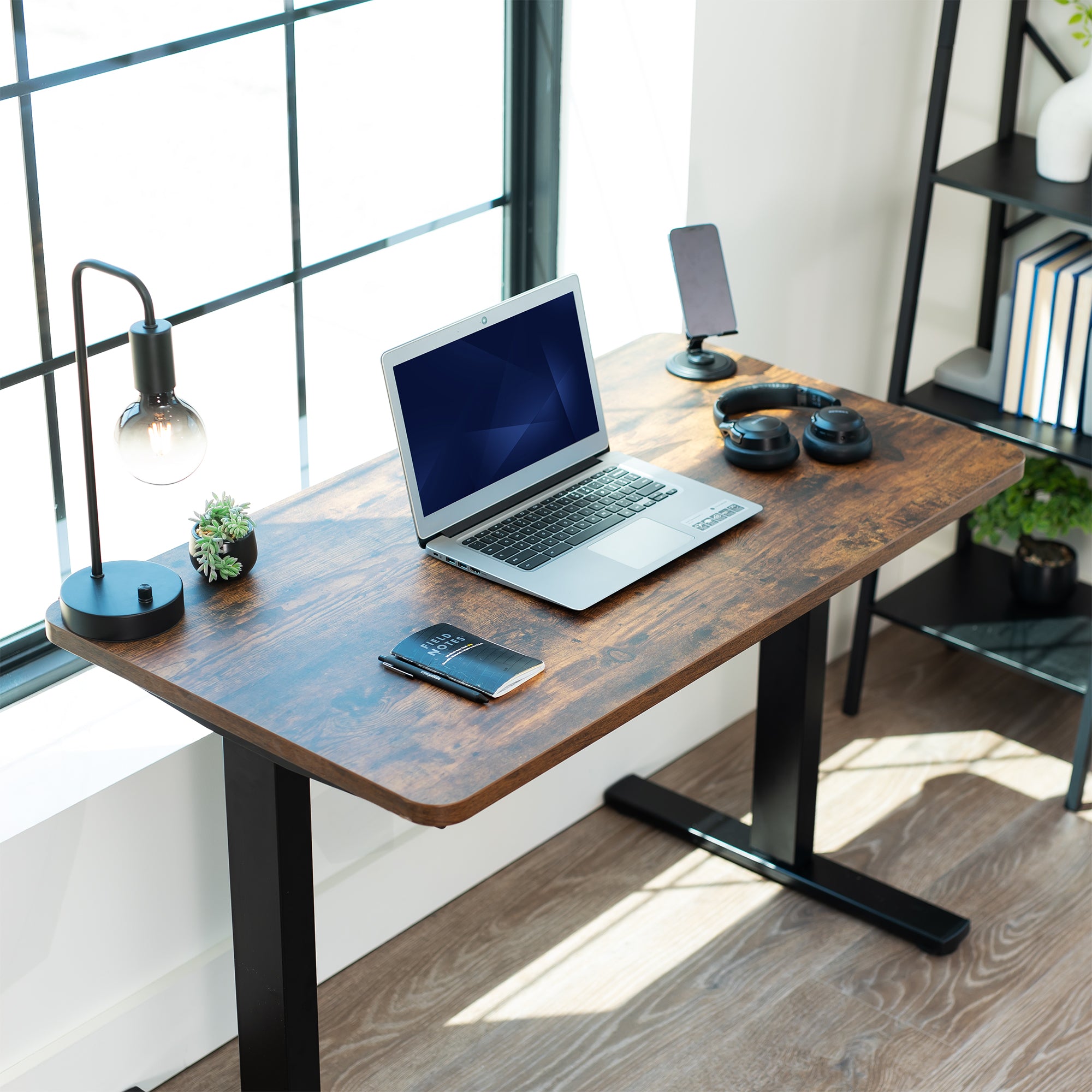 Vintage Brown 43in x 24in Particle Board Table Top on black frame in office setting