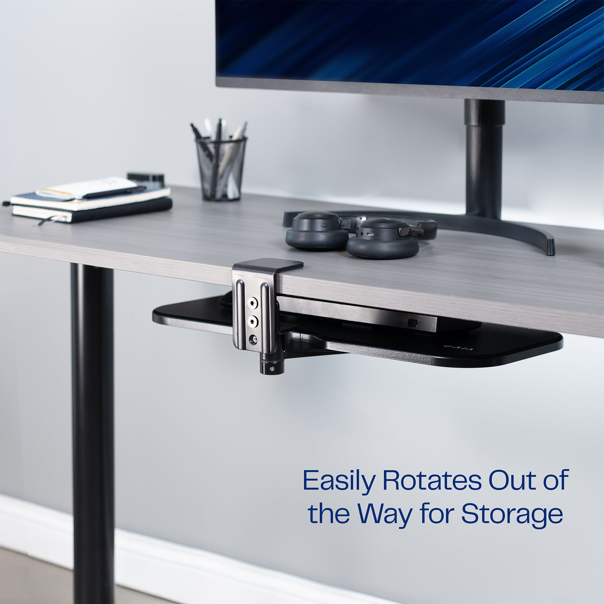 Single Clamp Rotating Keyboard Tray with easy hideaway storage highlighted