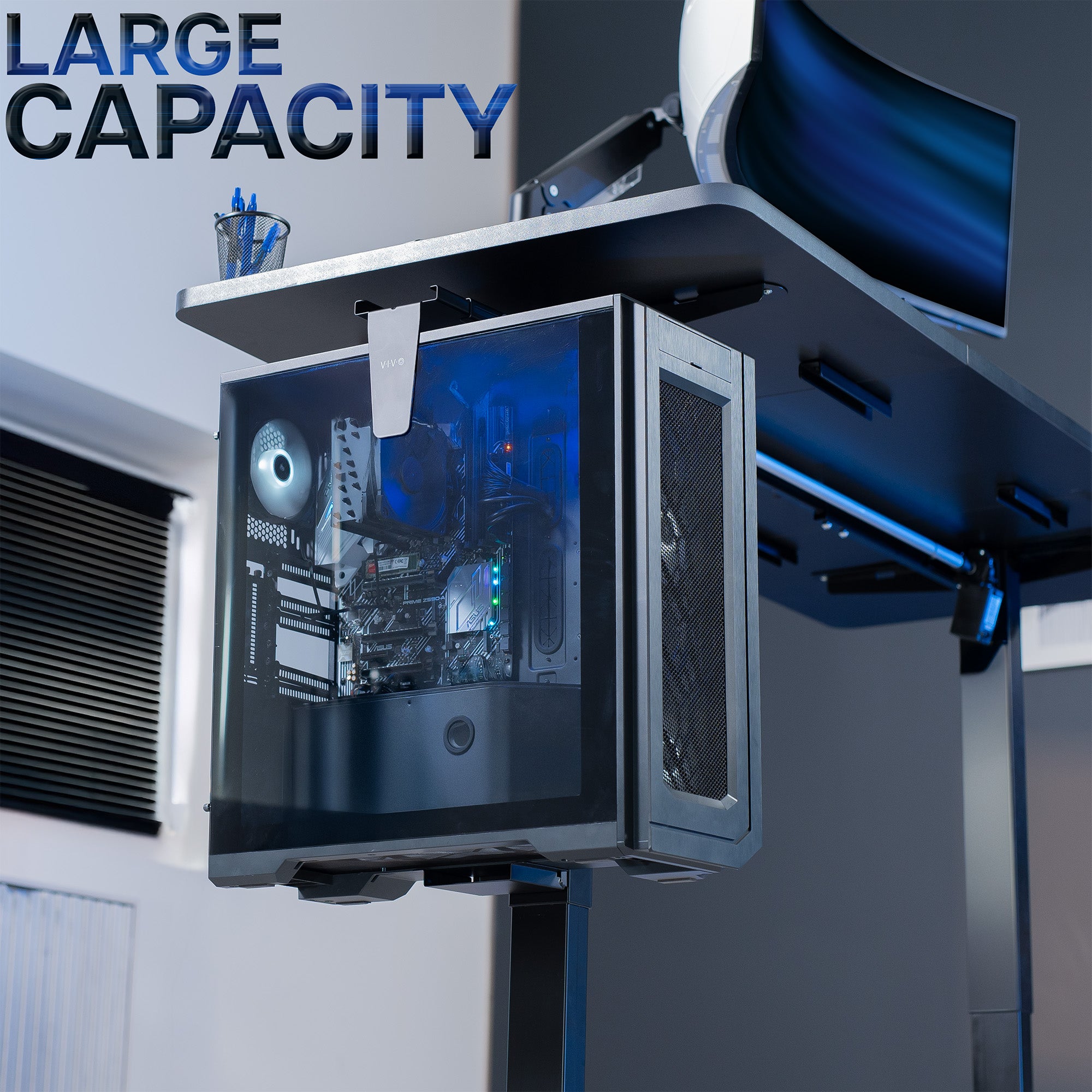 Computer case with visible internal components on a desk frame, labeled 'Large Capacity'.
