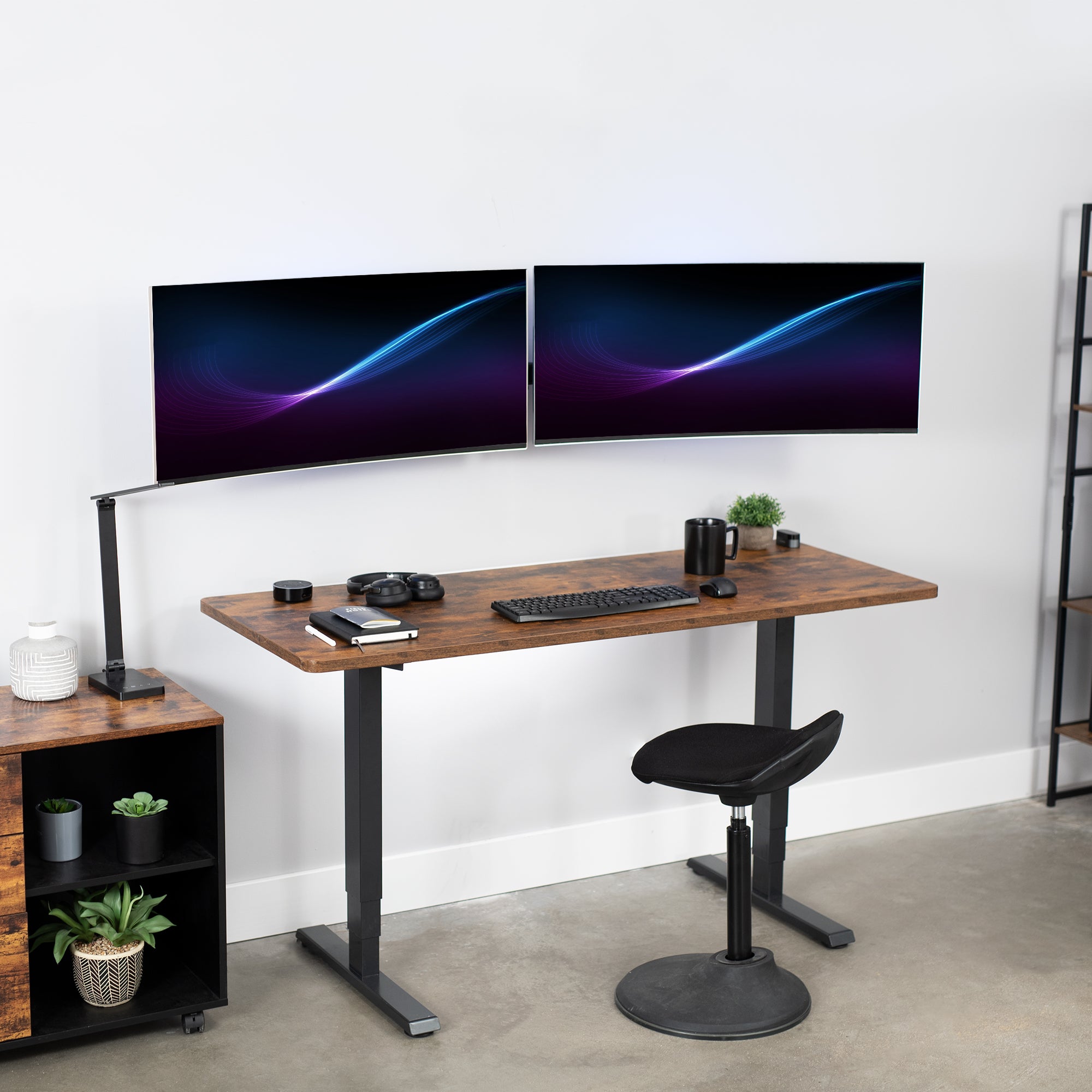 Telescoping dual monitor wall mount.