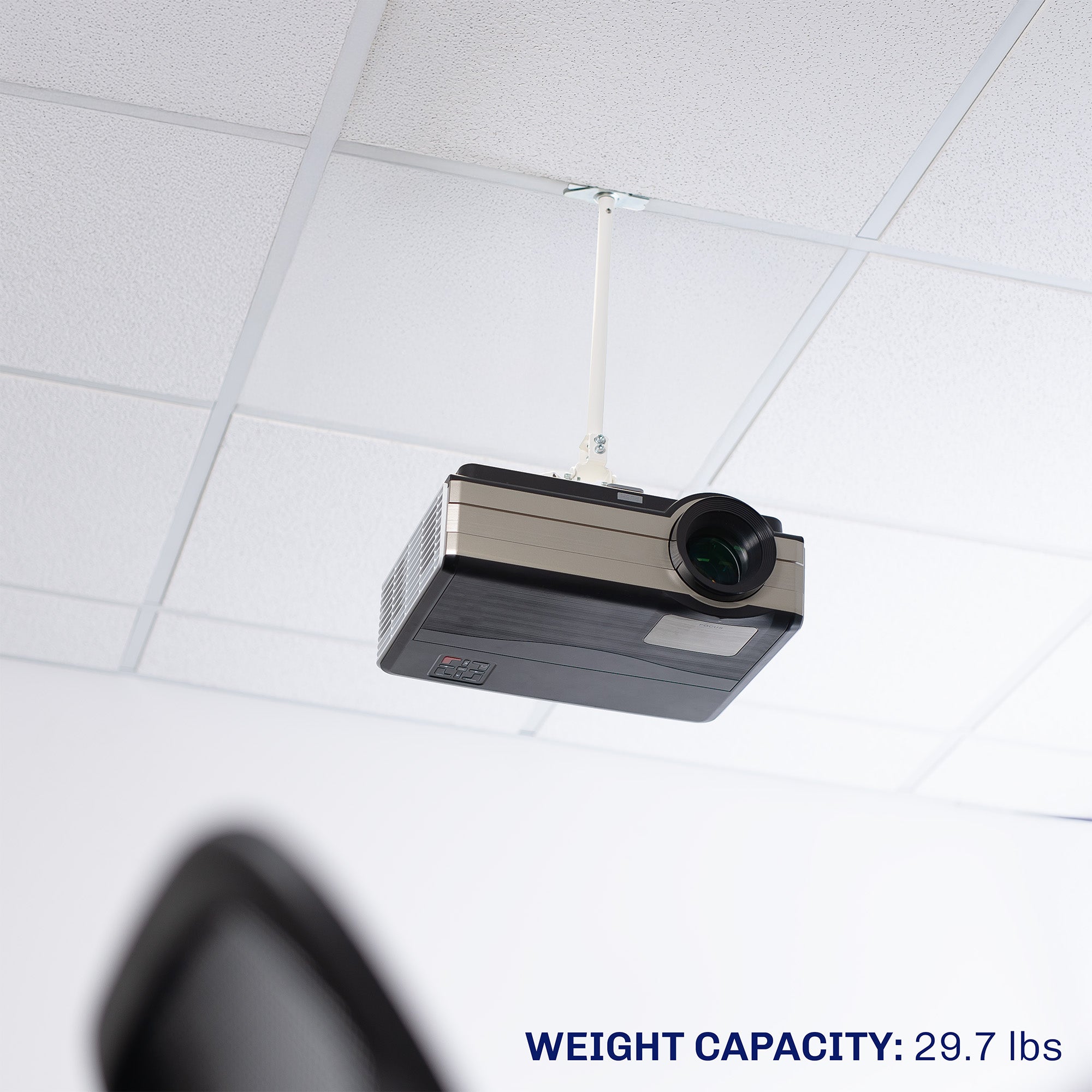 A white ceiling mount with scissor clamp designed to support projectors, featuring an adjustable length arm and a circular base.
