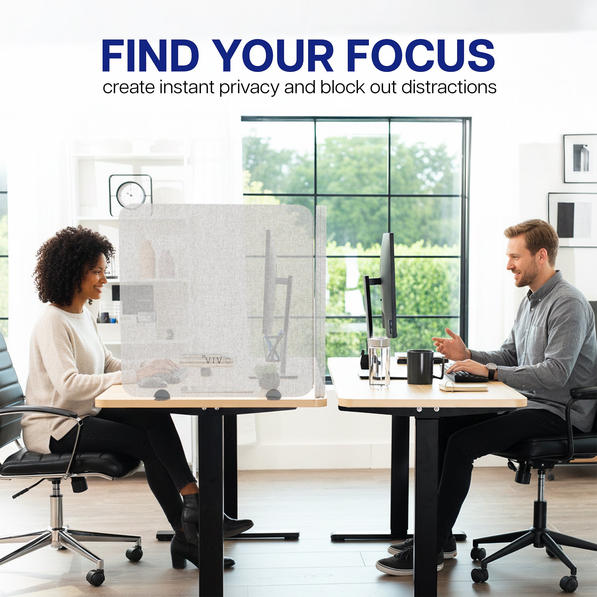 Two people working at desks with a Privacy Panel between them, text 'Find Your Focus' above.