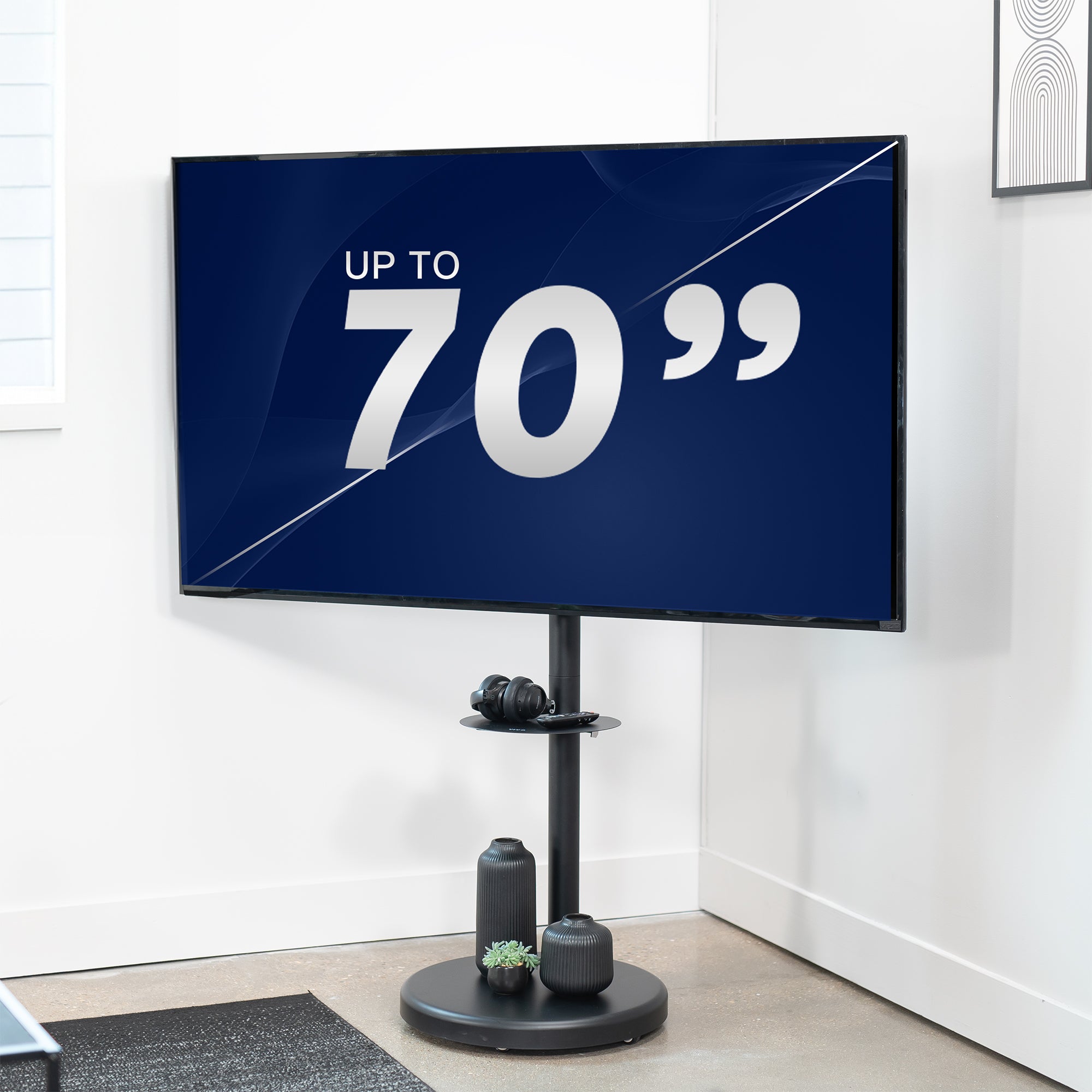 Mobile TV stand with shelf featuring height adjustment, tilt, swivel, rotation, and built-in cable management.