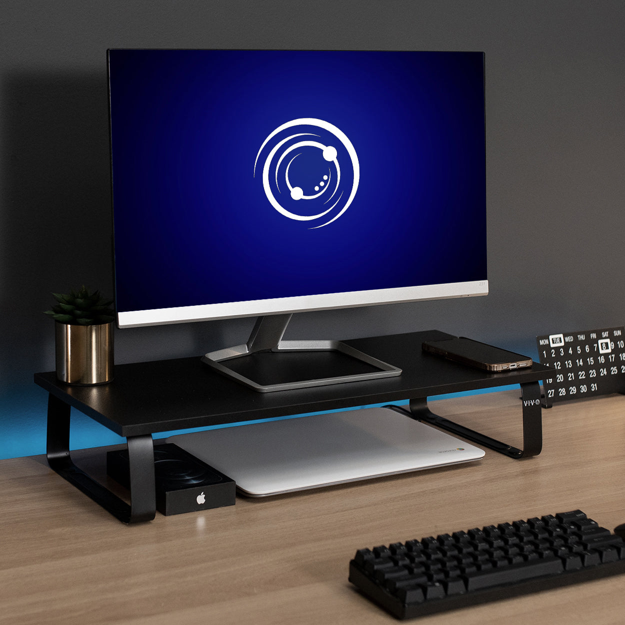 Elevate your monitor a couple of inches off your desktop for a more eye-level view.