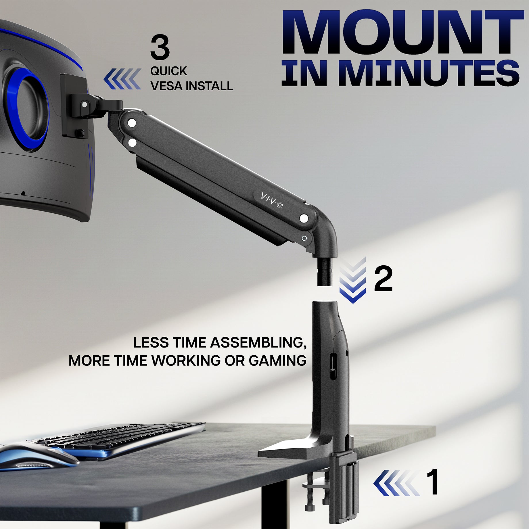 Monitor arm with quick VESA install feature on a desk setup.