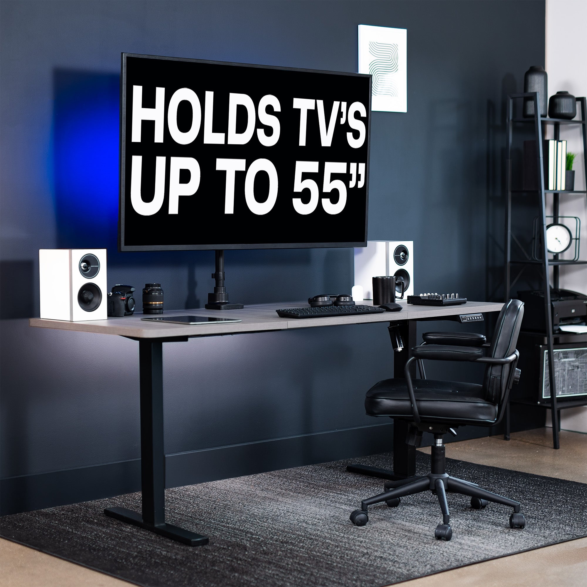 Low profile TV desk mount with articulating arm with cable management.