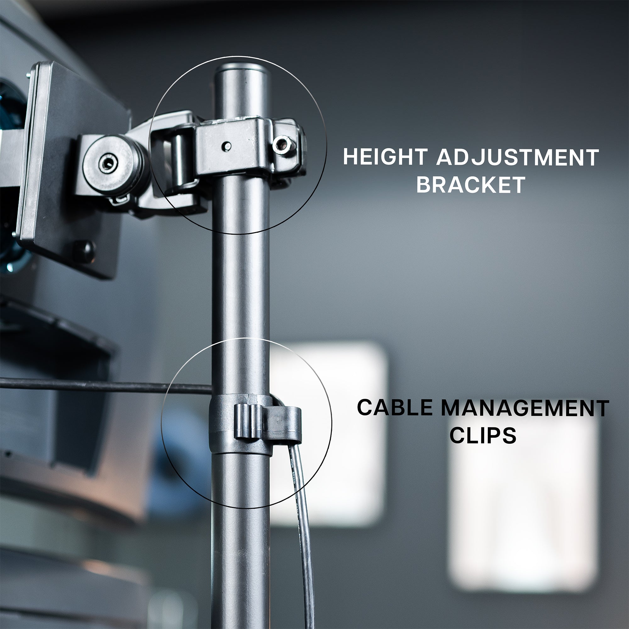 Stacked vertical dual monitor ultrawide desk mount with height adjustment, tilt, swivel, and integrated cable management.