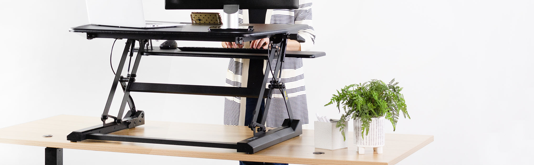 Electric Standing Desk vs. Standing Desk Riser - Which One is Right for You?