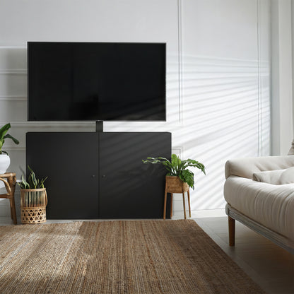 Modern living room with a black TV stand concealing the TV.