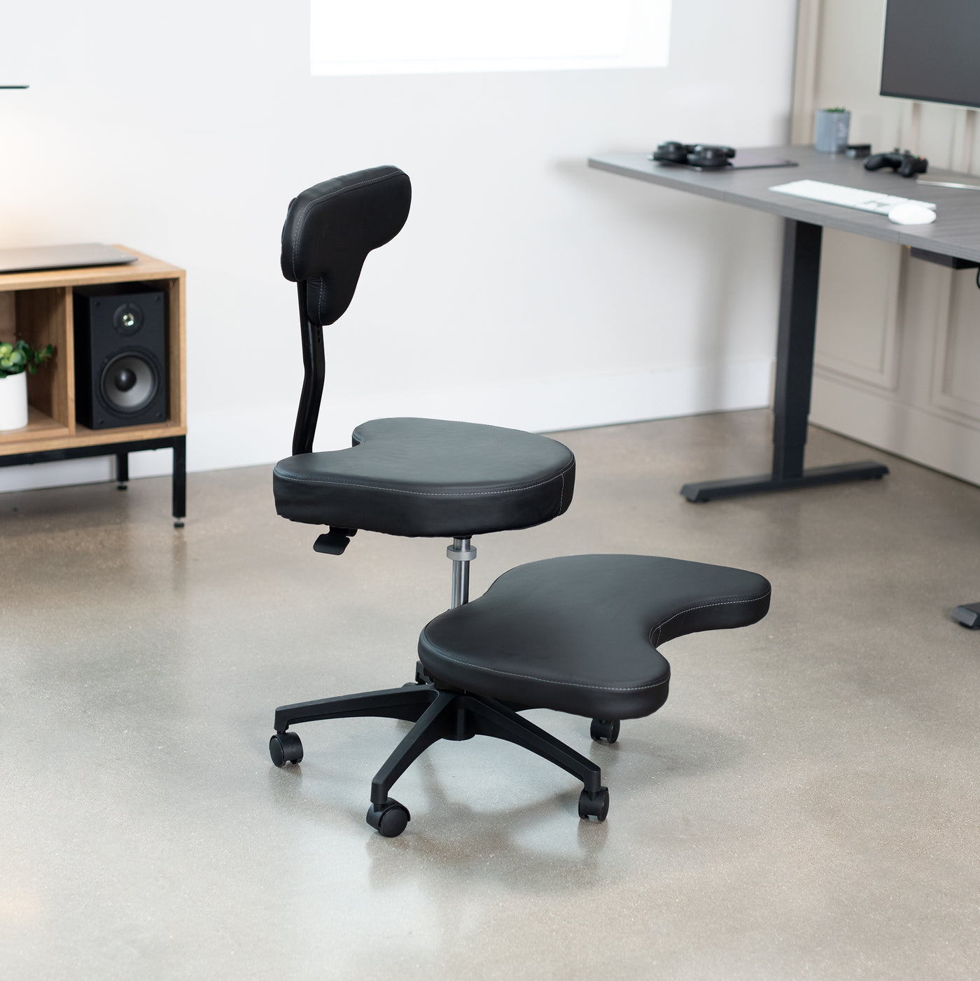 Fully adjustable cross legged desk chair with wheels for better posture and increased productivity.