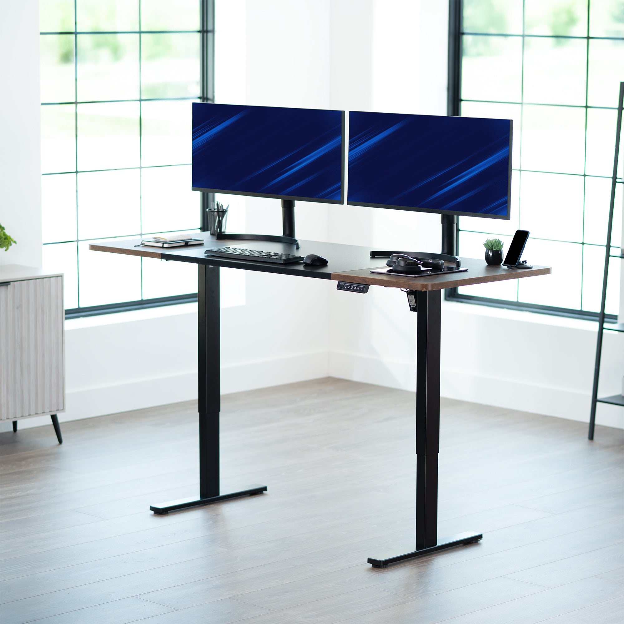 Large sturdy sit or stand modern desk with electric height adjustment options.