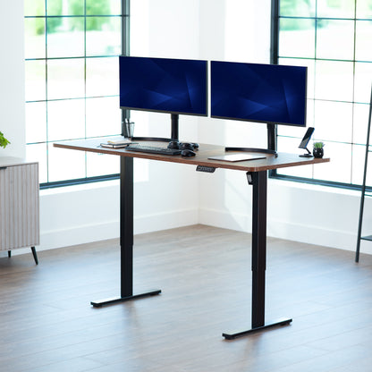 Large sturdy sit or stand modern desk with electric height adjustment options.