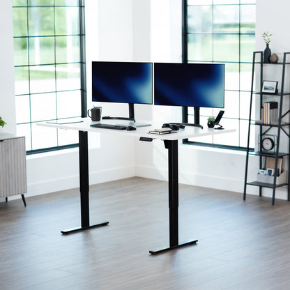 Large sturdy sit or stand modern desk with electric height adjustment options.