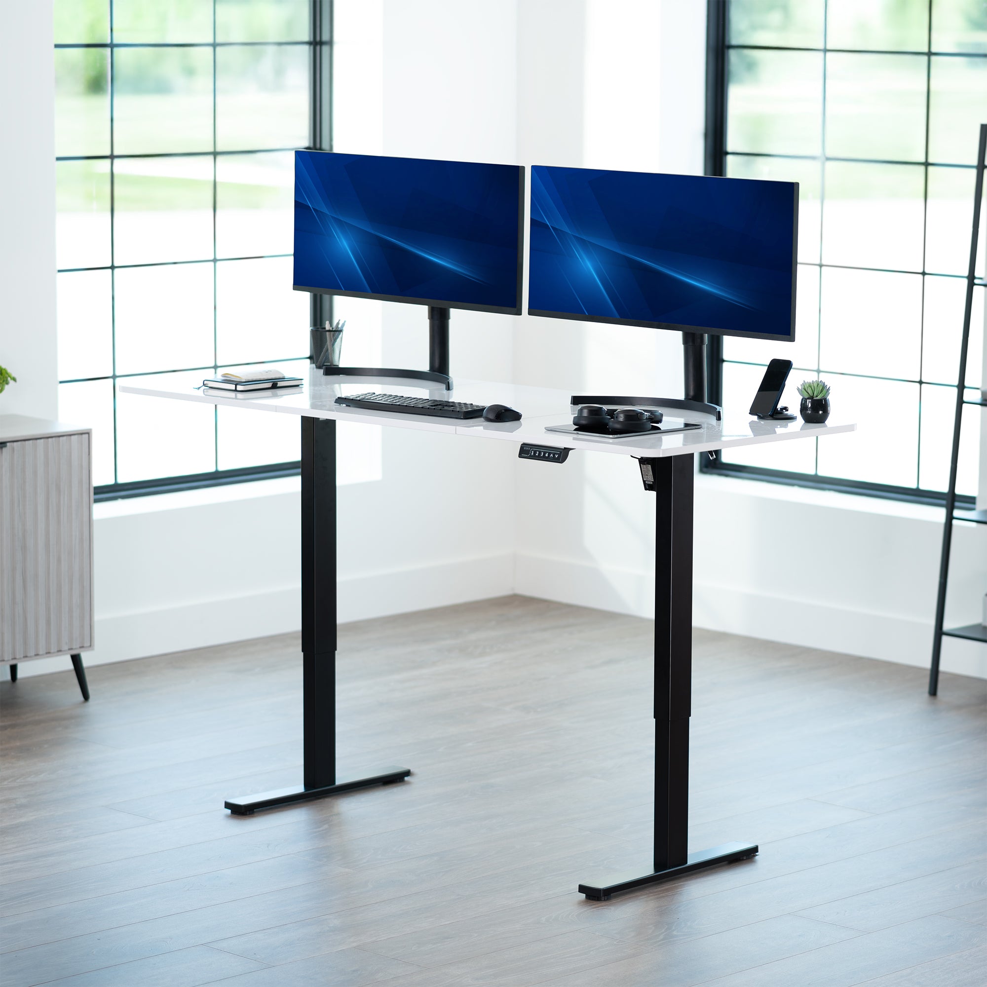 Large sturdy sit or stand modern desk with electric height adjustment options.