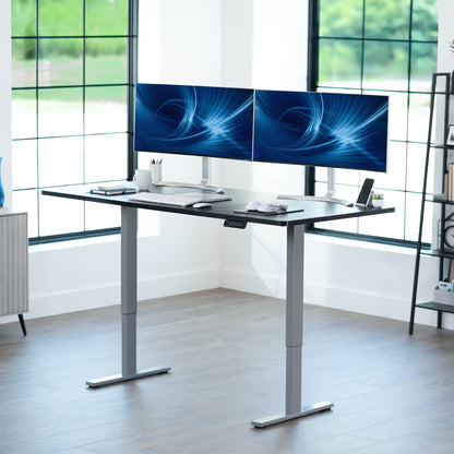 Large sturdy sit or stand modern desk with electric height adjustment options.