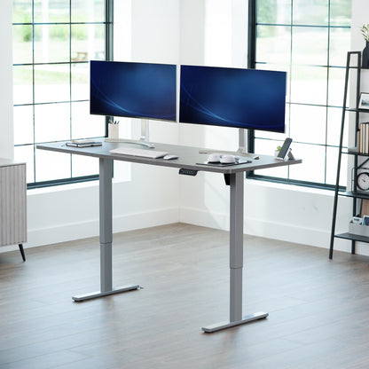 Large sturdy sit or stand modern desk with electric height adjustment options.