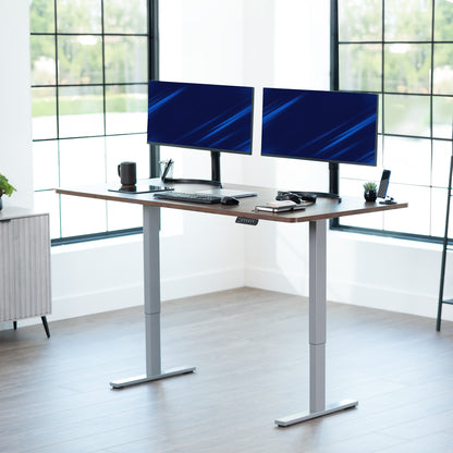 Large sturdy sit or stand modern desk with electric height adjustment options.