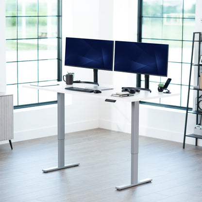 Large sturdy sit or stand modern desk with electric height adjustment options.