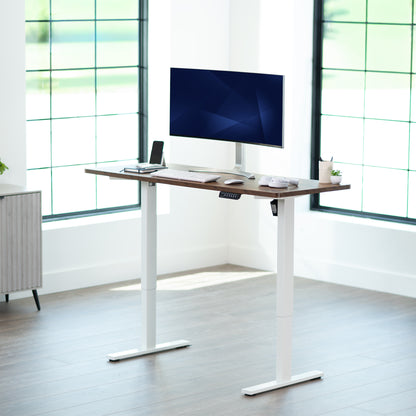 Sturdy ergonomic sit or stand active desk workstation with adjustable height using smart control panel.