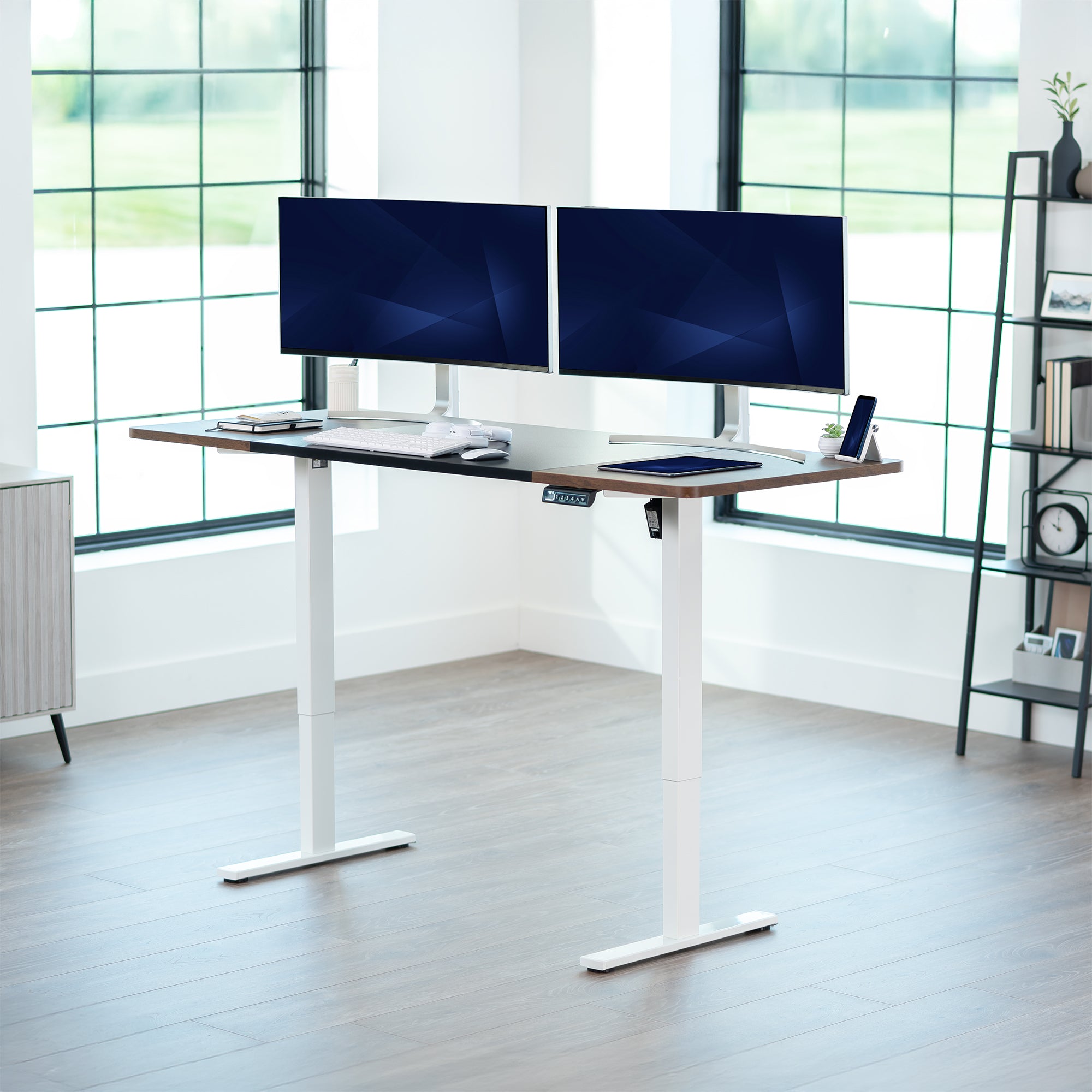 Large sturdy sit or stand modern desk with electric height adjustment options.