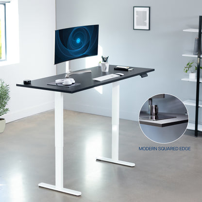71 x 30 inch dual motor electric desk with squared edges, featuring memory controller height adjustment with memory settings