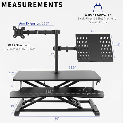 Sit to stand desk riser with built-in monitor mount and laptop mount.