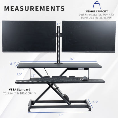 Sit to stand desk riser and dual monitor mount with electric height adjustment.