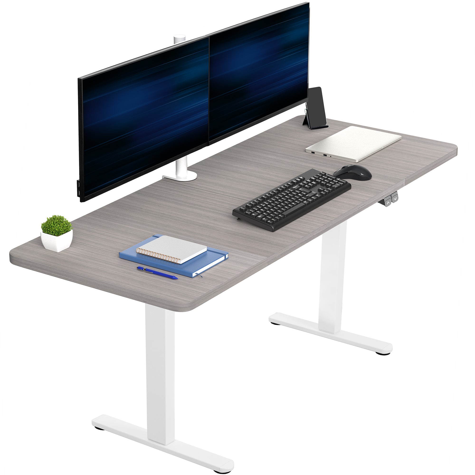 Gray desk with computer setup including monitors, keyboard, mouse, and stationery on a white background