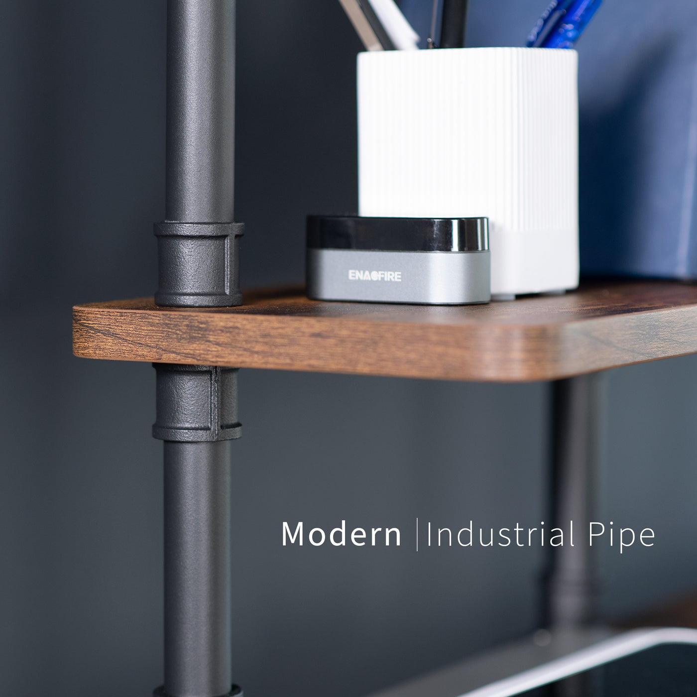 Clamp-on Industrial Pipe Shelves secure to your office desk and create dual level storage for clearing workspace clutter.