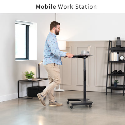 Electric mobile compact desk provides a height adjustable workstation for home or the office, featuring a 2 tier design for your screen and keyboard tray.