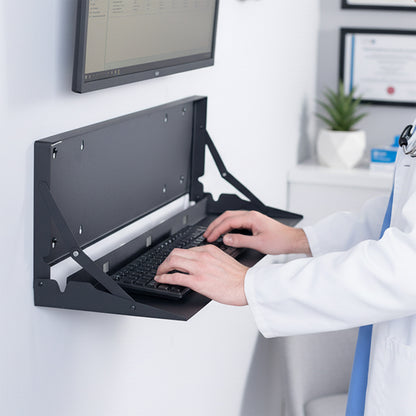 Large black wall-mounted flip down keyboard tray platform. Low profile design folds up and out of the way when not in use. Velcro included to keep keyboard in place. Fits a standard-sized keyboard and mouse (mouse pad included). Mount to drywall, wood studs, brick, or concrete.