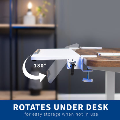 Desk with a rotating component for easy storage, set in a home office setting.