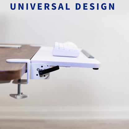 Adjustable clamp-on desk bracket with an extension tray.