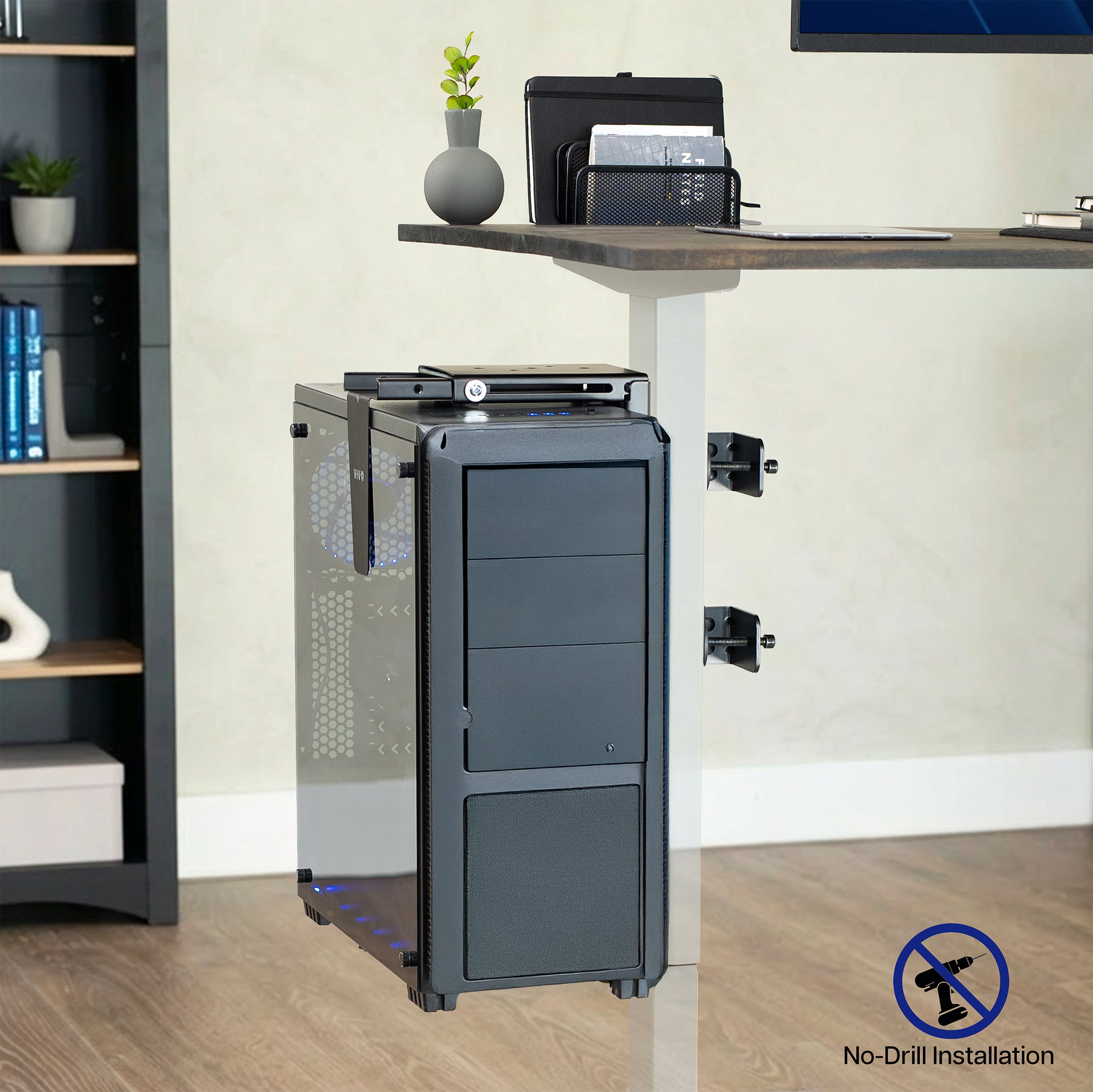 Clamp-on PC mount secures to desk legs for convenient placement.