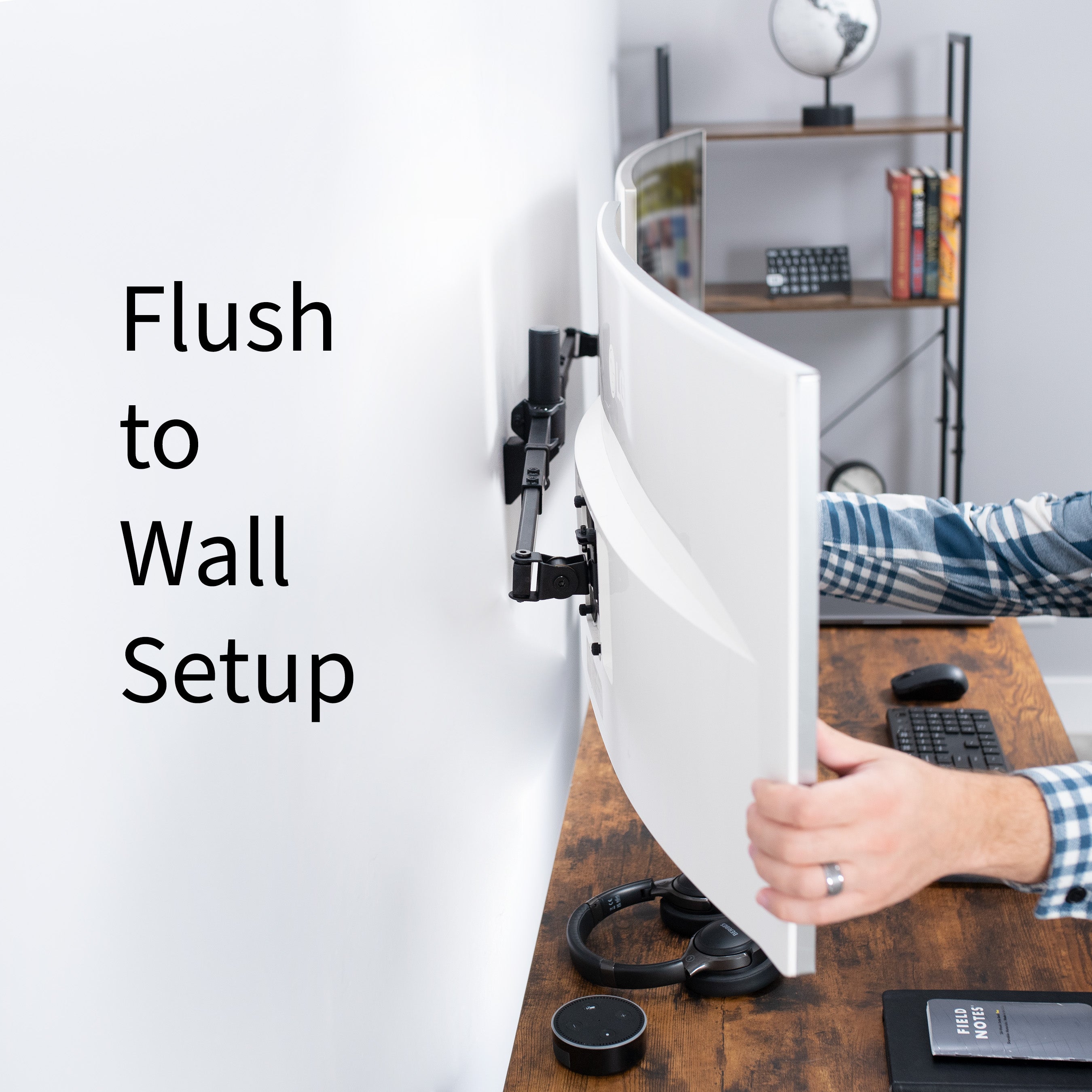Telescoping dual monitor wall mount.