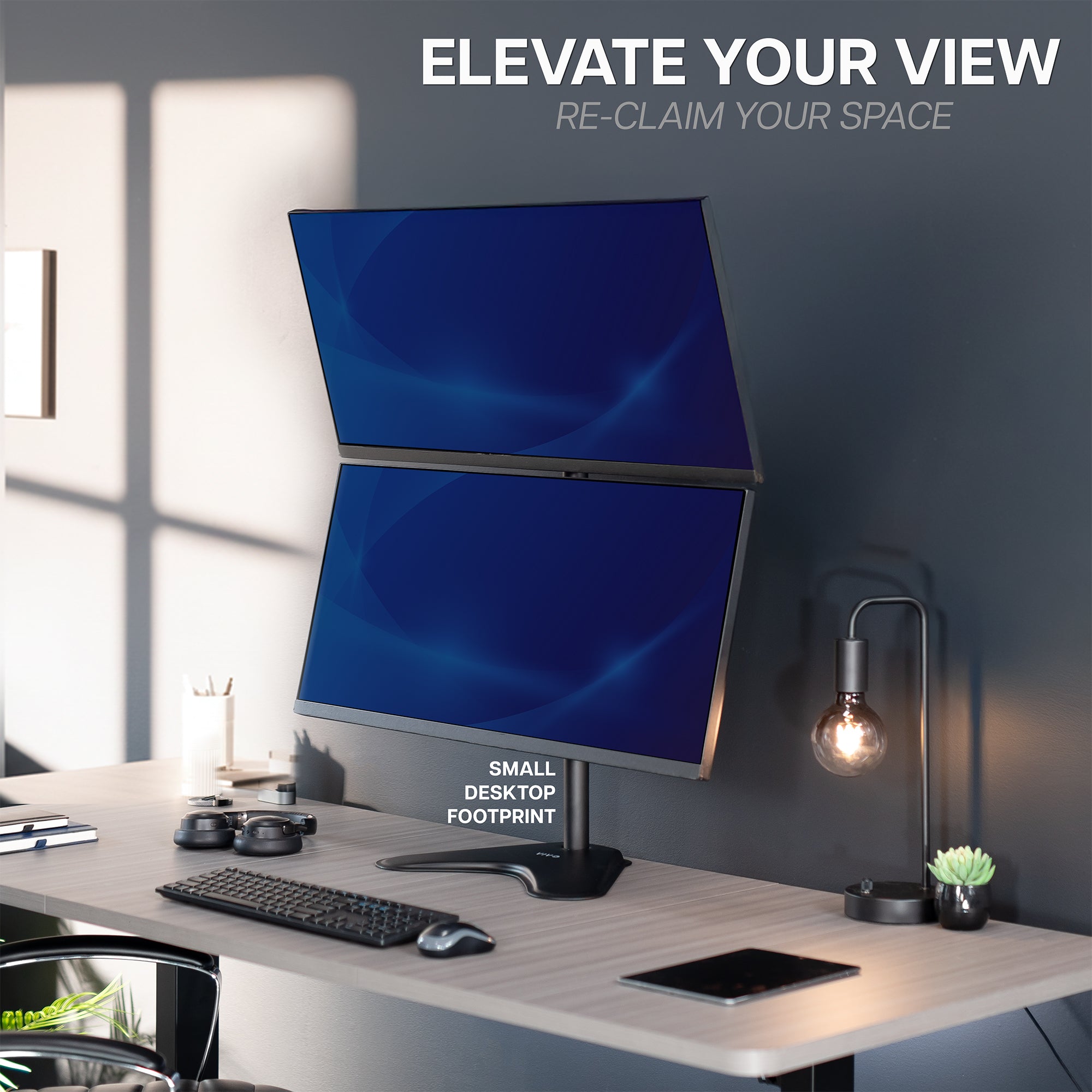 Modern office setup with dual monitors on a desk stand, featuring text 'Elevate Your View' and 'Re-claim Your Space'.