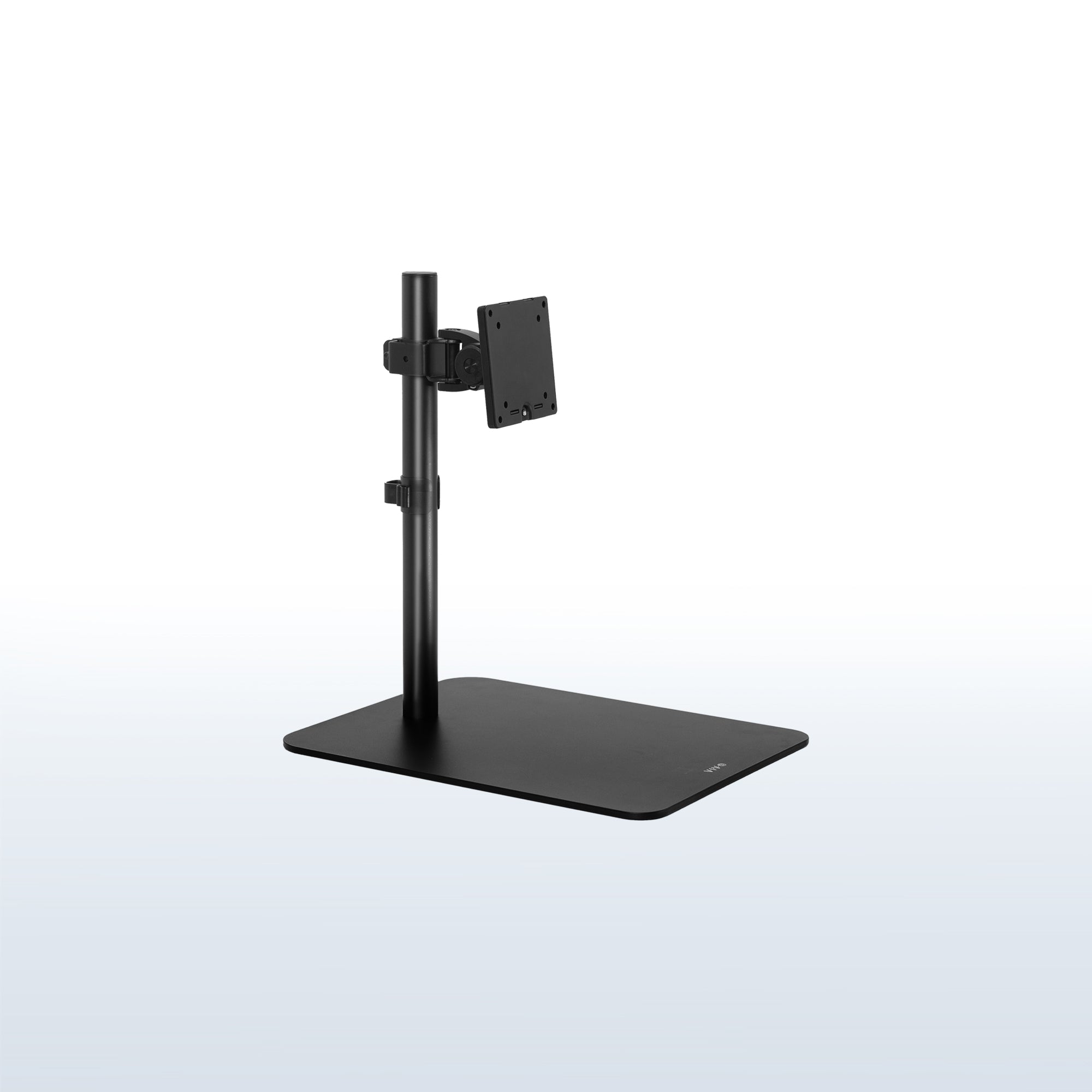 Adjustable monitor stand with glass base.