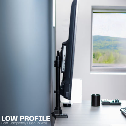 Low profile TV desk mount with articulating arm with cable management.