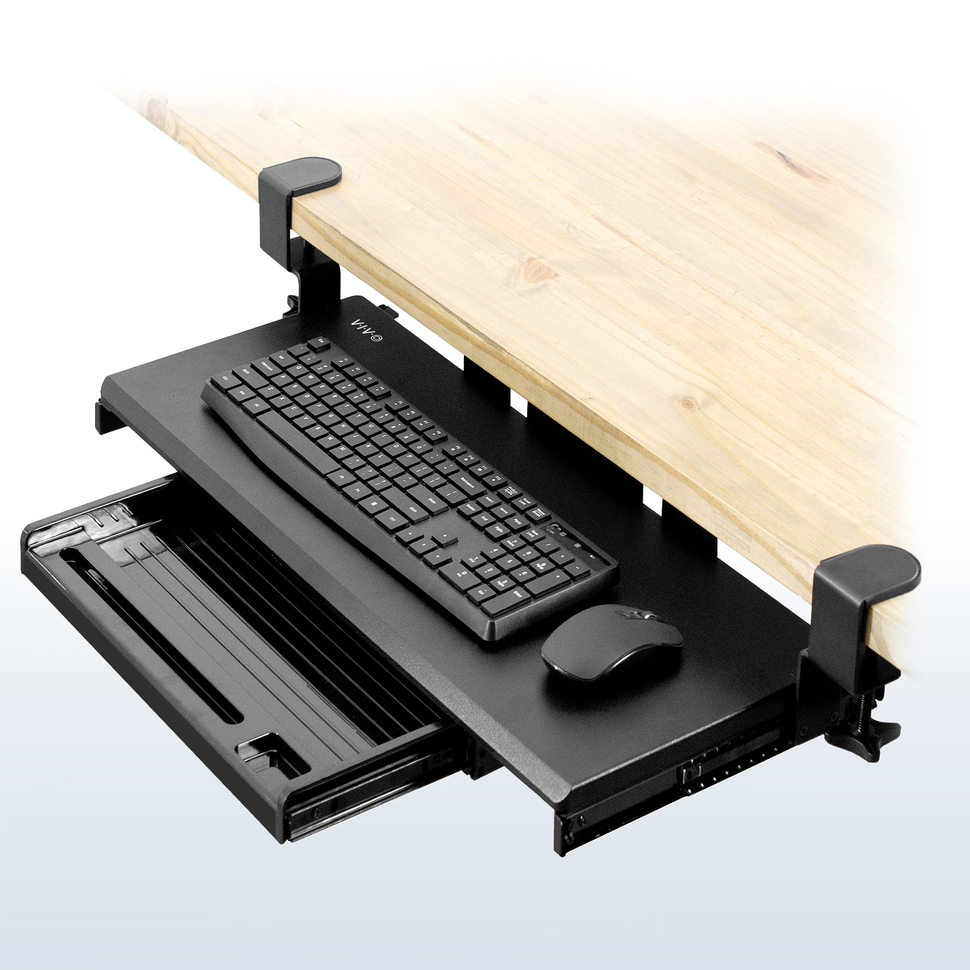 Clamp-on keyboard tray with pencil drawer for convenient space-saving desk workstation.