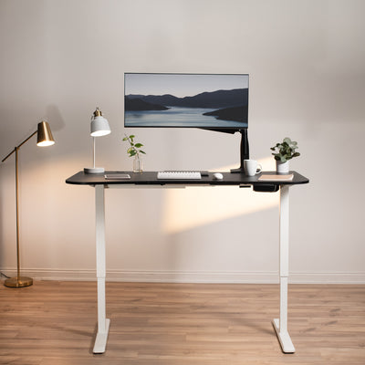 Ergonomic sit or stand active workstation with adjustable height using touch screen control panel.