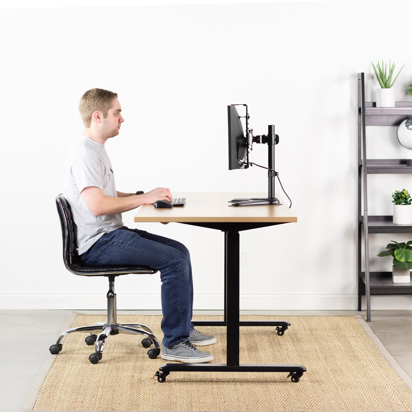 Ergonomic workstation with adaptable VESA bracket kit