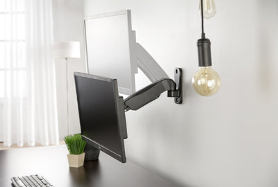 Sturdy adjustable pneumatic arm single monitor ergonomic wall mount for office workstation.