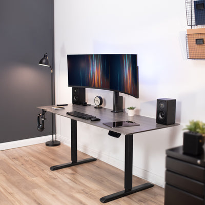 Adjustable desk frame with dual monitor mount combo.