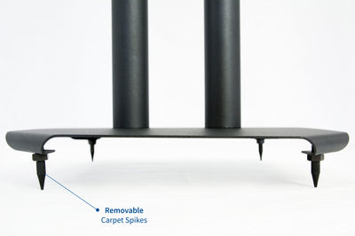 Surround sound stands with removable carpet spikes.