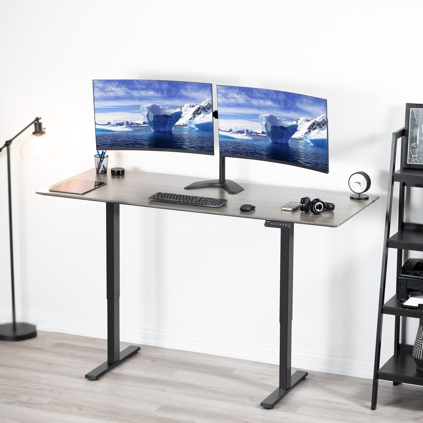 Modern sit to stand office seek with a dual monitor mount stand.