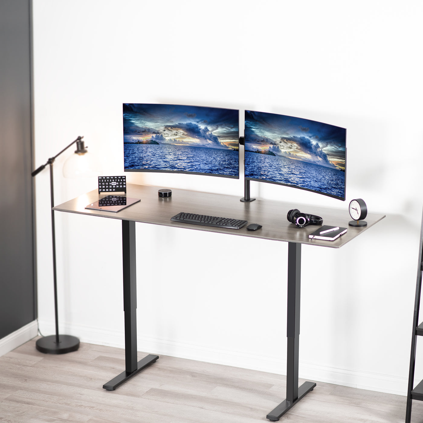 Sturdy adjustable telescoping arms for dual computer monitors.