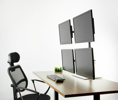 Sturdy height adjustable quad monitor desk stand.